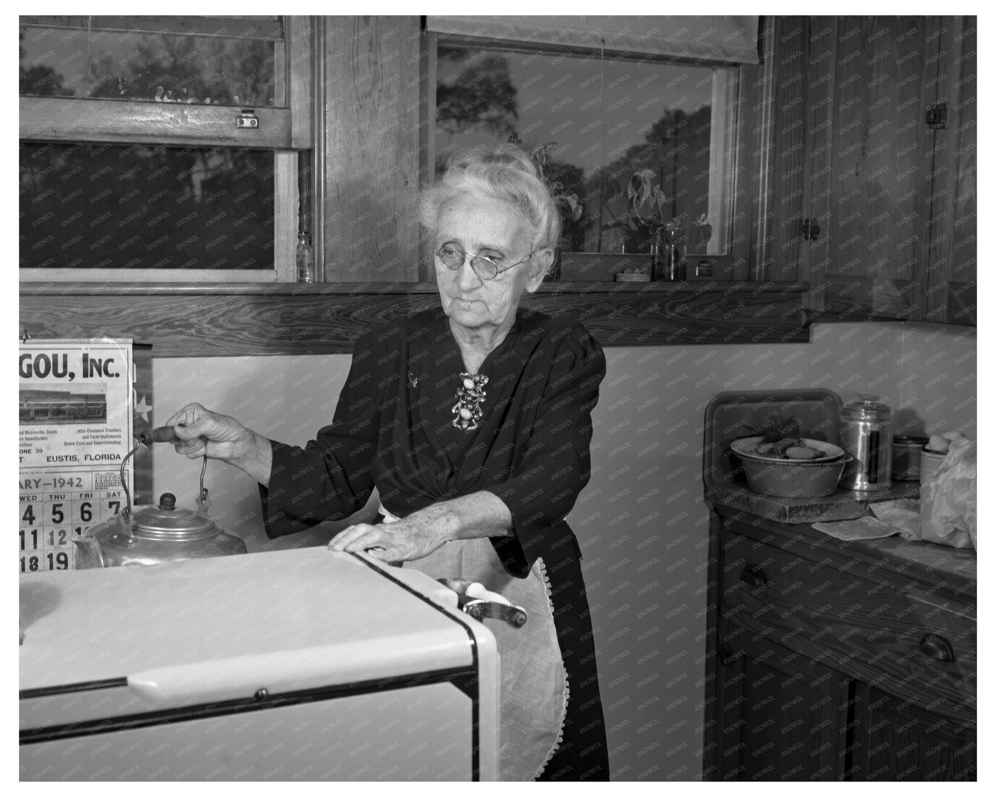 Katie La Roe Cooking for Family in Eustis Florida 1942 - Available at KNOWOL