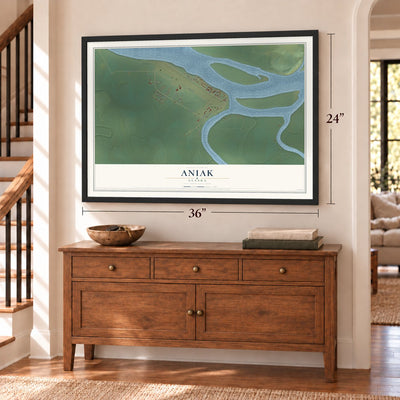 Aniak, Alaska map, 24 x 36 inch print in a black frame above a dresser by a staircase