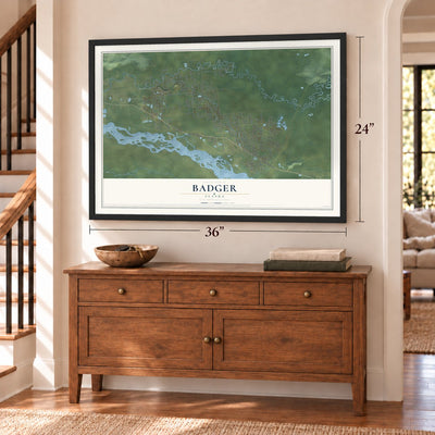 Badger, Alaska map, 24 x 36 inch print in a black frame above a dresser by a staircase