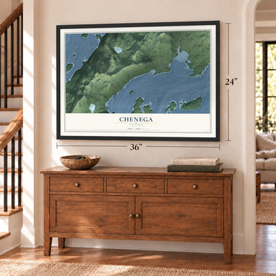 Chenega, Alaska map, 24 x 36 inch print in a black frame above a dresser by a staircase