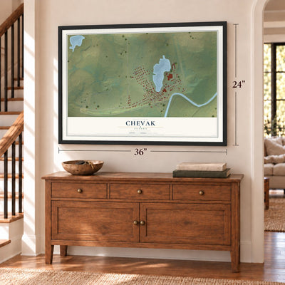 Chevak, Alaska map, 24 x 36 inch print in a black frame above a dresser by a staircase
