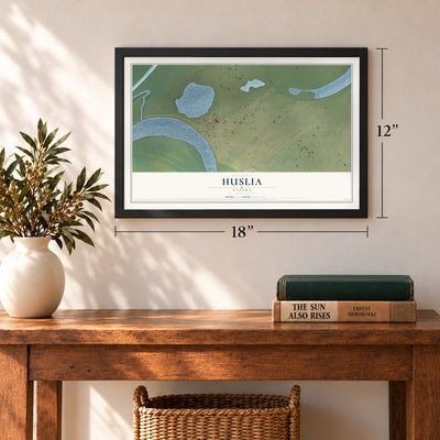 Huslia, Alaska map, 12 x 18 inch print in a black frame in an entryway