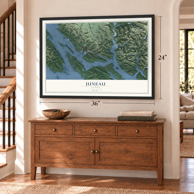 Juneau, Alaska map, 24 x 36 inch print in a black frame above a dresser by a staircase