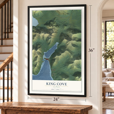 King Cove, Alaska map, 24 x 36 inch print in a black frame by a staircase