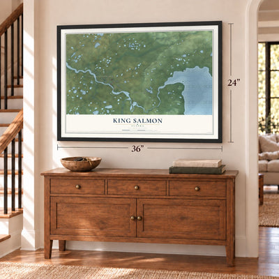 King Salmon, Alaska map, 24 x 36 inch print in a black frame above a dresser by a staircase