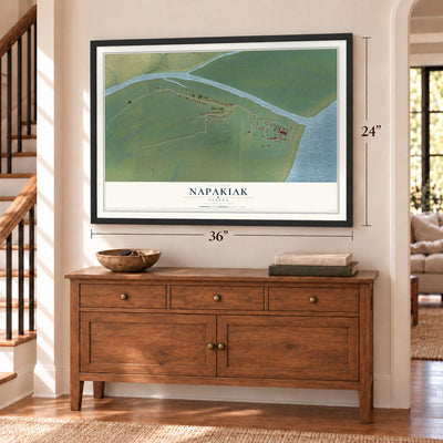 Napakiak, Alaska map, 24 x 36 inch print in a black frame above a dresser by a staircase