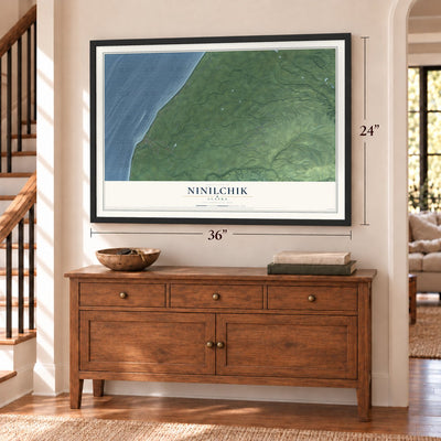 Ninilchik, Alaska map, 24 x 36 inch print in a black frame above a dresser by a staircase