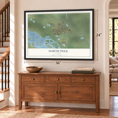 North Pole, Alaska map, 24 x 36 inch print in a black frame above a dresser by a staircase