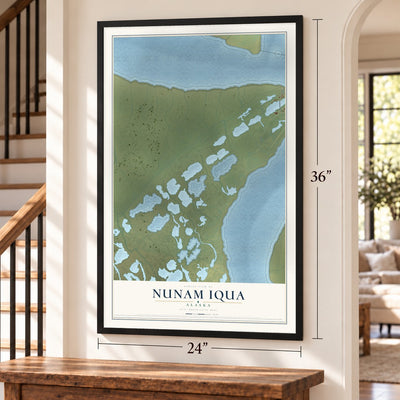Nunam Iqua, Alaska map, 24 x 36 inch print in a black frame by a staircase
