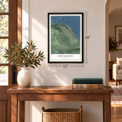 Port Graham, Alaska map, 12 x 18 inch print in a black frame in an entryway