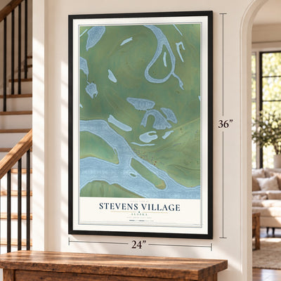 Stevens Village, Alaska map, 24 x 36 inch print in a black frame by a staircase