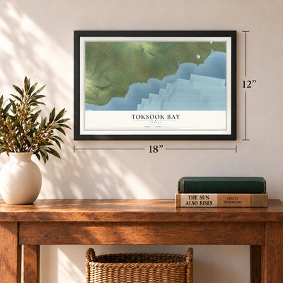 Toksook Bay, Alaska map, 12 x 18 inch print in a black frame in an entryway