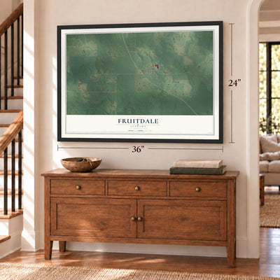 Fruitdale, Alabama map, 24 x 36 inch print in a black frame above a dresser by a staircase