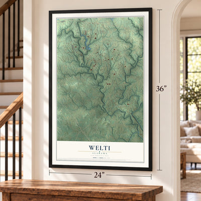Welti, Alabama map, 24 x 36 inch print in a black frame by a staircase