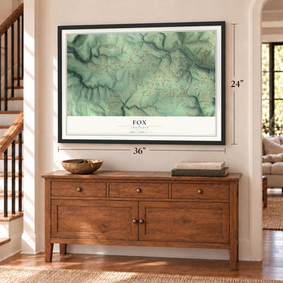 Fox, Arkansas map, 24 x 36 inch print in a black frame above a dresser by a staircase