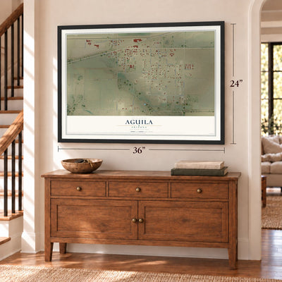 Aguila, Arizona map, 24 x 36 inch print in a black frame above a dresser by a staircase