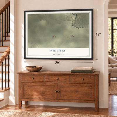 Red Mesa, Arizona map, 24 x 36 inch print in a black frame above a dresser by a staircase