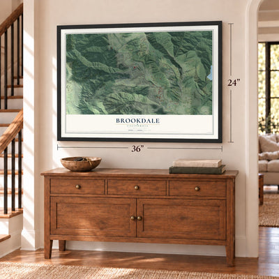 Brookdale, California map, 24 x 36 inch print in a black frame above a dresser by a staircase