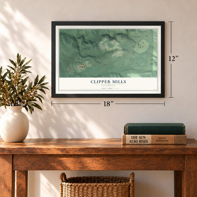 Clipper Mills, California map, 12 x 18 inch print in a black frame in an entryway