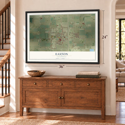 Easton, California map, 24 x 36 inch print in a black frame above a dresser by a staircase