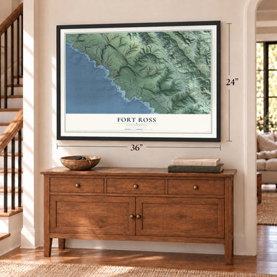 Fort Ross, California map, 24 x 36 inch print in a black frame above a dresser by a staircase