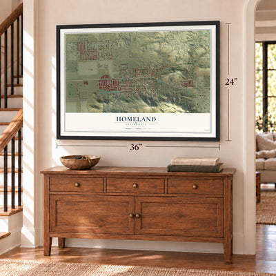 Homeland, California map, 24 x 36 inch print in a black frame above a dresser by a staircase