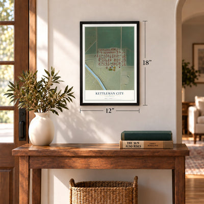 Kettleman City, California map, 12 x 18 inch print in a black frame in an entryway