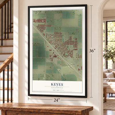 Keyes, California map, 24 x 36 inch print in a black frame by a staircase