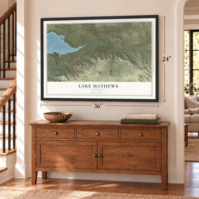 Lake Mathews, California map, 24 x 36 inch print in a black frame above a dresser by a staircase