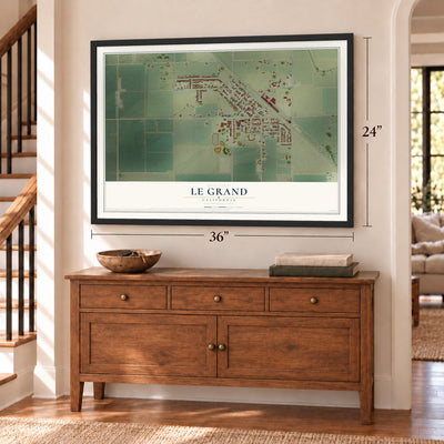 Le Grand, California map, 24 x 36 inch print in a black frame above a dresser by a staircase