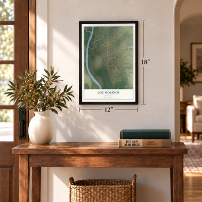 Los Molinos, California map, 12 x 18 inch print in a black frame in an entryway