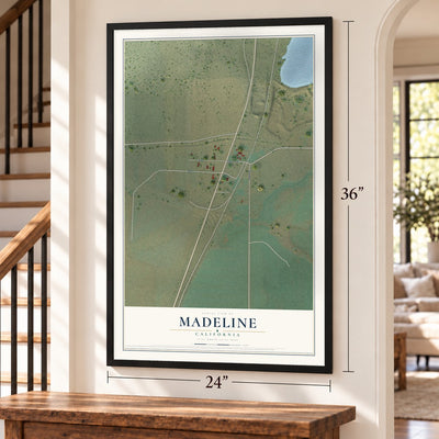 Madeline, California map, 24 x 36 inch print in a black frame by a staircase