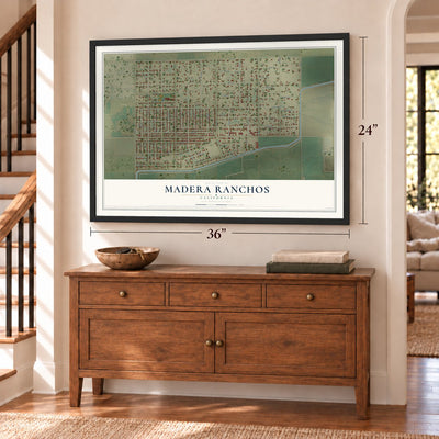 Madera Ranchos, California map, 24 x 36 inch print in a black frame above a dresser by a staircase