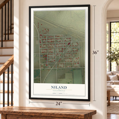 Niland, California map, 24 x 36 inch print in a black frame by a staircase