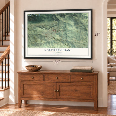 North San Juan, California map, 24 x 36 inch print in a black frame above a dresser by a staircase