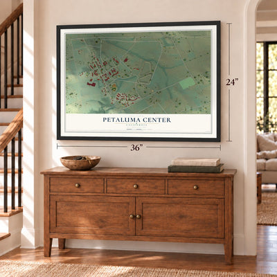 Petaluma Center, California map, 24 x 36 inch print in a black frame above a dresser by a staircase