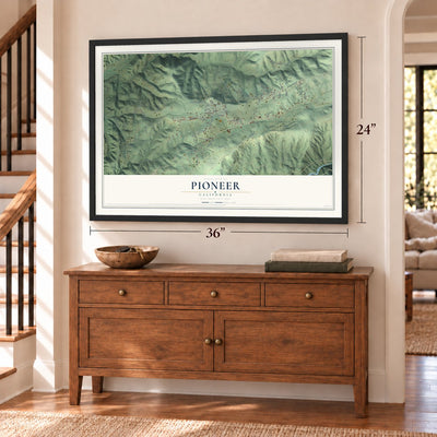 Pioneer, California map, 24 x 36 inch print in a black frame above a dresser by a staircase