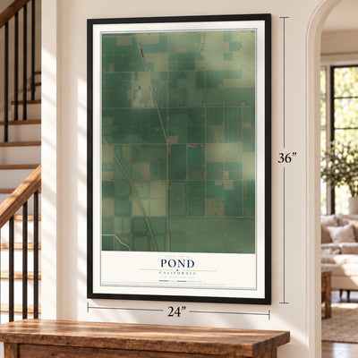 Pond, California map, 24 x 36 inch print in a black frame by a staircase