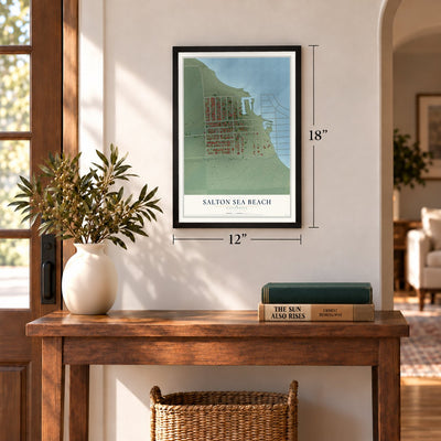 Salton Sea Beach, California map, 12 x 18 inch print in a black frame in an entryway