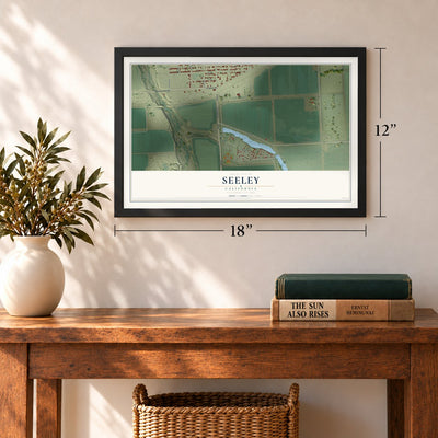 Seeley, California map, 12 x 18 inch print in a black frame in an entryway