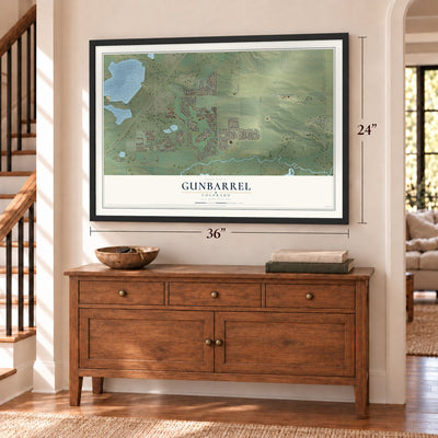 Gunbarrel, Colorado map, 24 x 36 inch print in a black frame above a dresser by a staircase