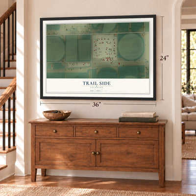 Trail Side, Colorado map, 24 x 36 inch print in a black frame above a dresser by a staircase
