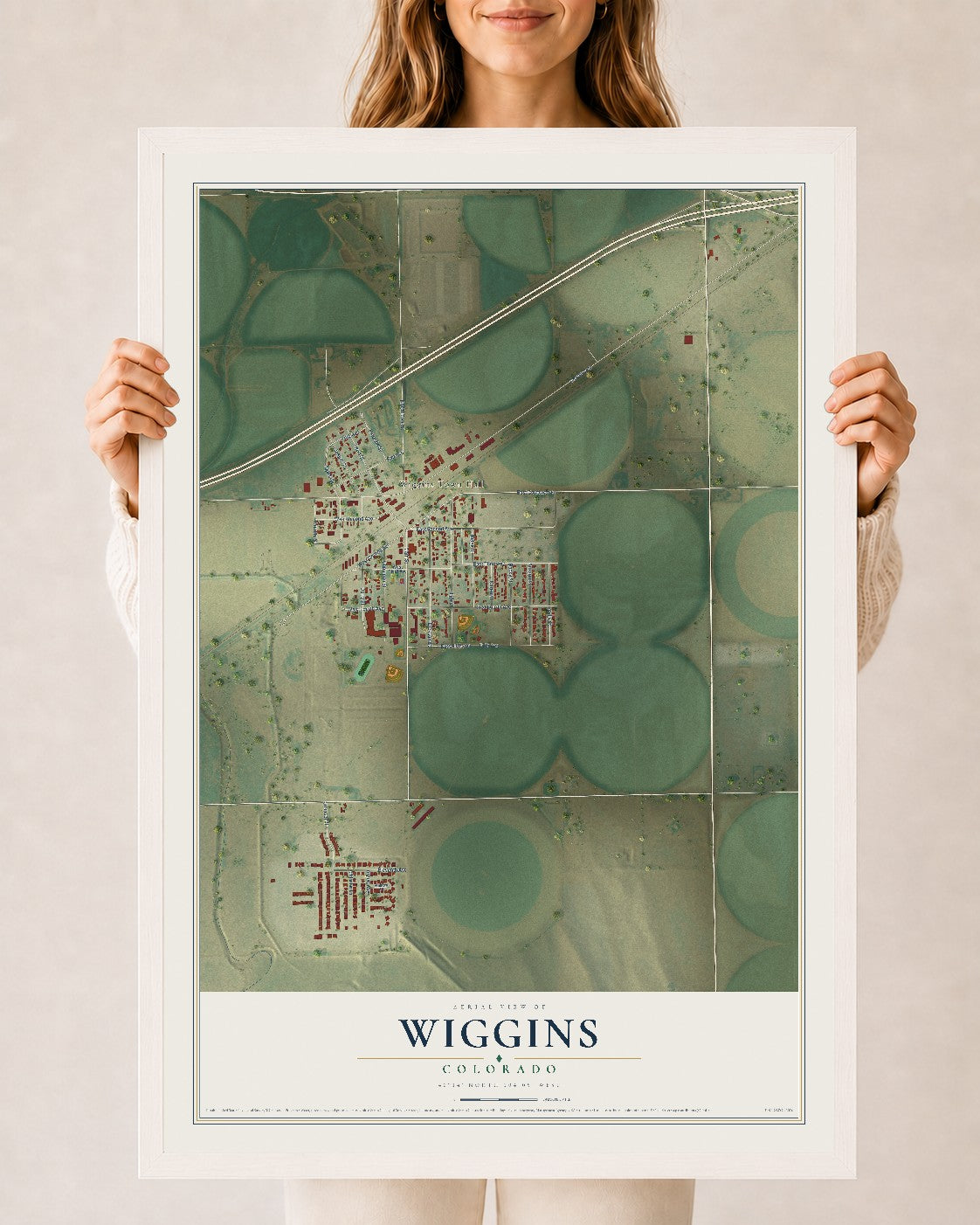 Map of Wiggins, Colorado, 24 x 36 inch print in a white wood frame