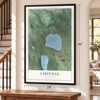 Lakeville, Connecticut map, 24 x 36 inch print in a black frame by a staircase