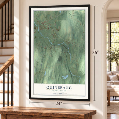 Quinebaug, Connecticut map, 24 x 36 inch print in a black frame by a staircase