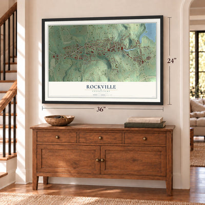 Rockville, Connecticut map, 24 x 36 inch print in a black frame above a dresser by a staircase