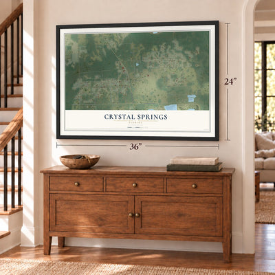 Crystal Springs, Florida map, 24 x 36 inch print in a black frame above a dresser by a staircase