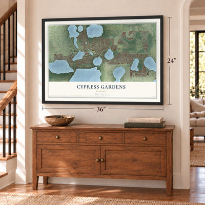 Cypress Gardens, Florida map, 24 x 36 inch print in a black frame above a dresser by a staircase