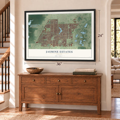 Jasmine Estates, Florida map, 24 x 36 inch print in a black frame above a dresser by a staircase