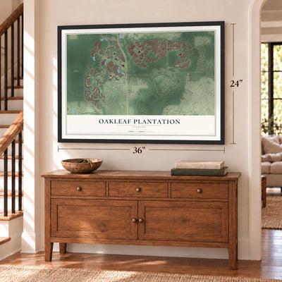 Oakleaf Plantation, Florida map, 24 x 36 inch print in a black frame above a dresser by a staircase